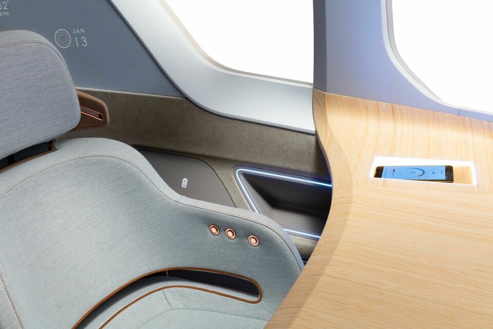 XiM20 – the interior controls can be accessed via the Smart Interior Surface (SIS) table in the front, as well as via a smartphone app XiM20 Front seat view-0541