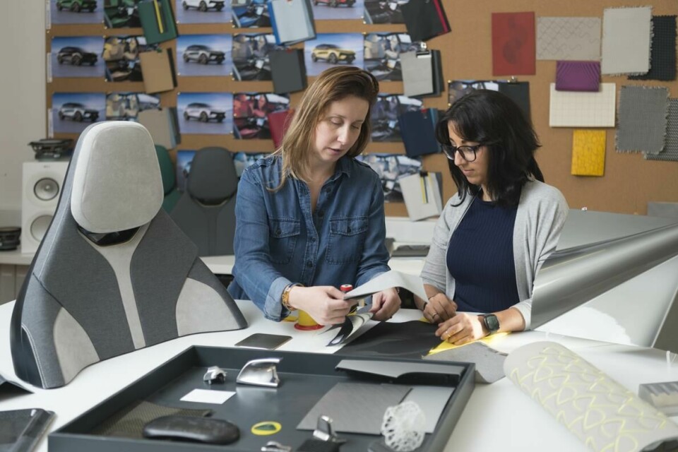Camille-Lecoq discussing seat upholstery options with colleague Kirsty Sahota _DSC9464