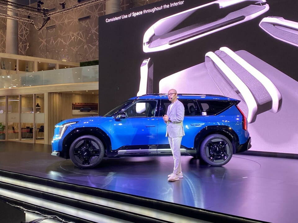 Teck-Koun Kim on stand with the Kia EV9 Teck-Koun Kim on stand with the Kia EV9