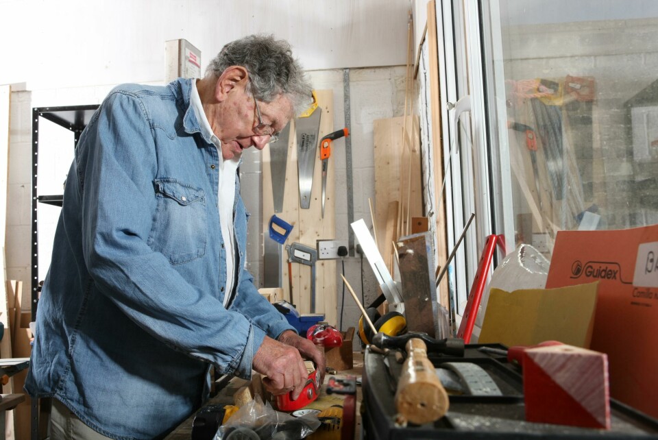 Tom Karen in his later years. The designer never lost his passion for design Tom Karen in workshop