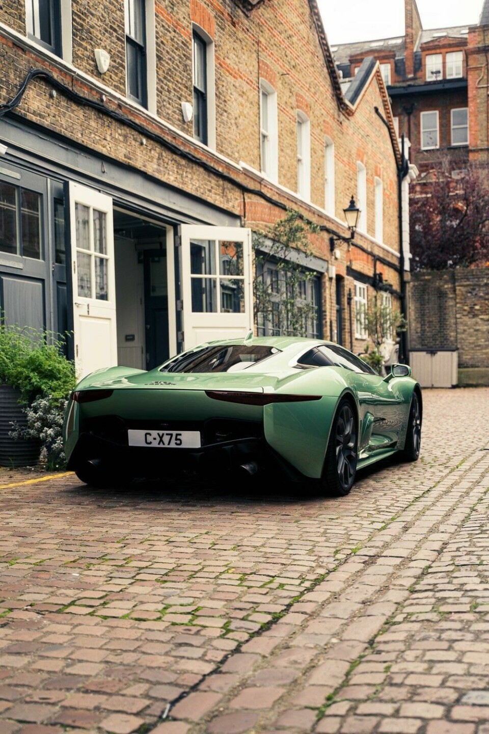 Resplendent in a cobbled mews (credit: Daniel Rossi) Callum C-X75 besoke commission Mews rear portrait (credit Daniel Rossi)