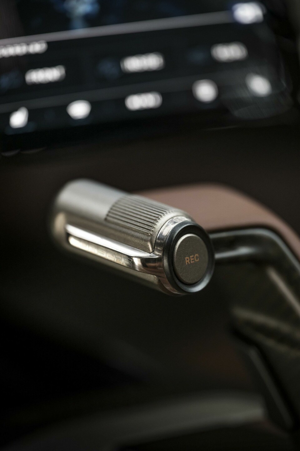 “There’s a button so you can start recording with the car’s built-in cameras” Porsche Mission X interior216_2752x4128