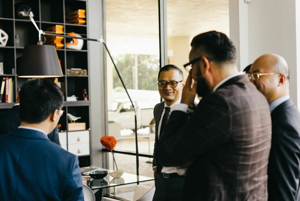 Fontaeus (check suit) in conversation with colleagues including GAC design boss Fan Zhang Pontus-2.jpg