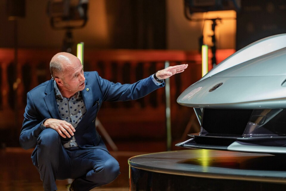 Lotus design director Russell Carr gently petting the new Evija… (not really) Lotus design director Russell Carr gently petting the new Evija... (not really)