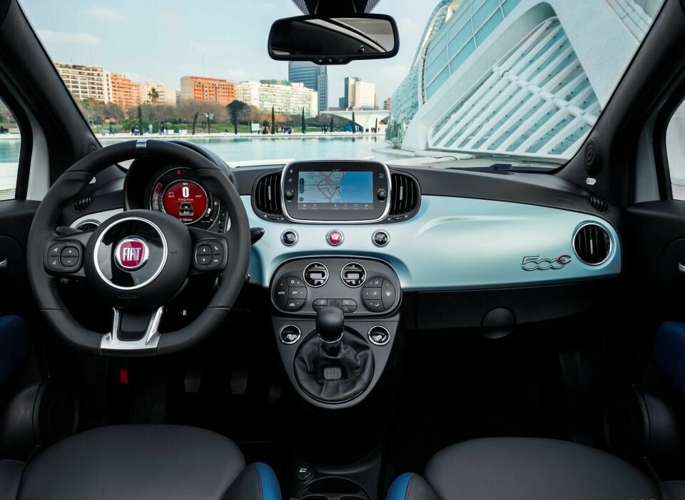 A screen from 2016, shoehorned into an interior from 2007. Available new in 2020 2016-present Fiat 500 interior