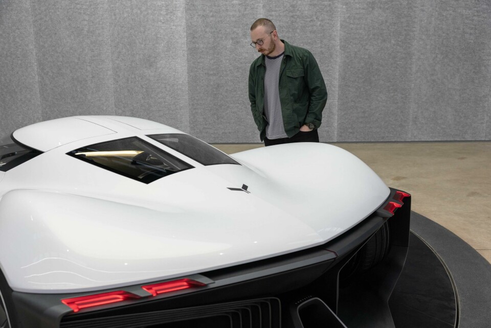 T-top roof inspired by original ’vette Stingray Freddie Holmes inspects Corvette concept rear window