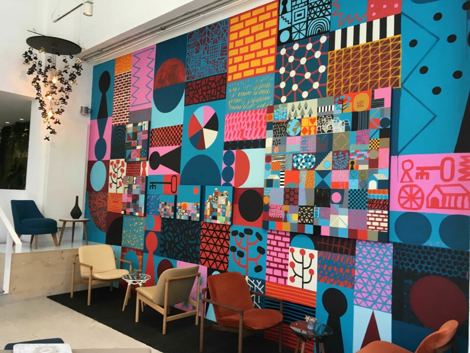 1970s-style mural – and natural-wood lighting – at Morgan CDN Clerkenwell Design Week 2019 Morgan