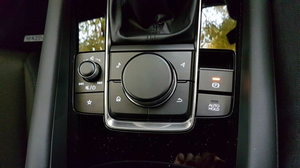 Want to operate the screen? Touch these, non-screeny things… Mazda 3 Skyactiv-X centre console controls