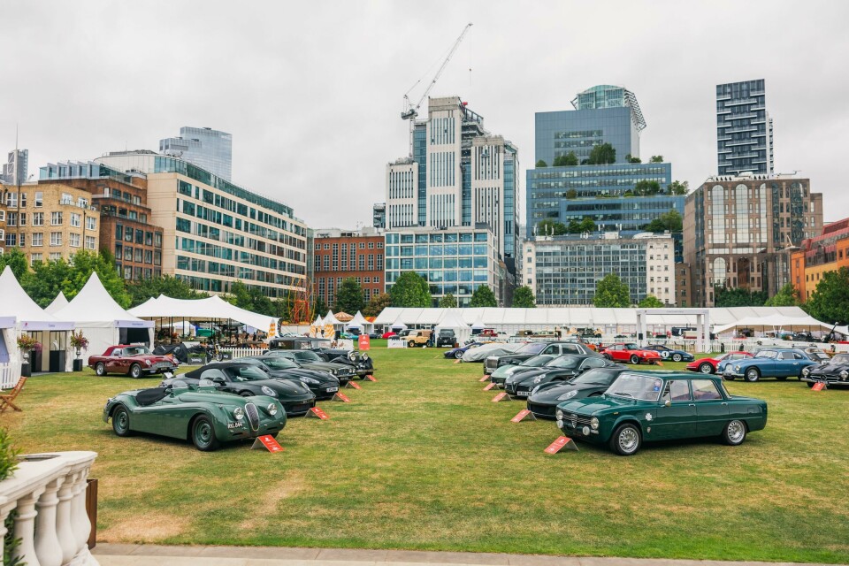 Aston DBS in British Racing Green nestled middle left between Jag and Porsche 2023 London Concours 5