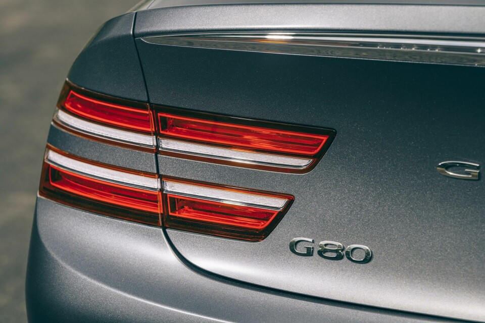 The rear lights mirror the clean headlamp design Genesis G80