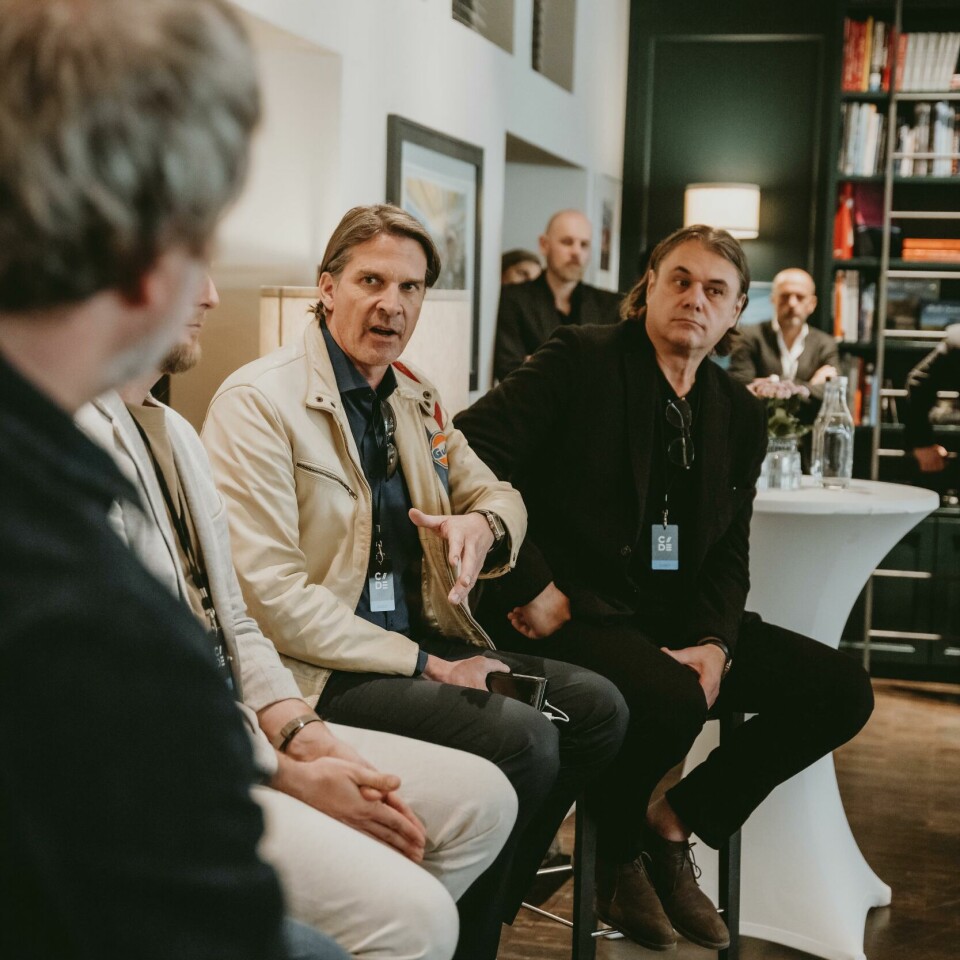 David Hilton (cream jacket) speaks on the panel CDN panel discussion at CDE 2024-455