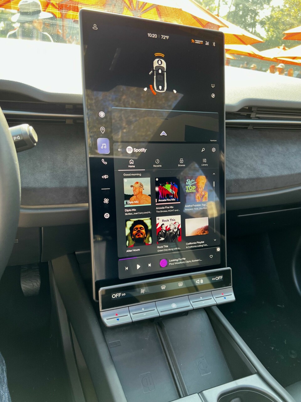 The enormous screen in the Fisker Ocean can pivot from portrait mode for driving to landscape mode for Netflix binging when parked Caption: The enormous screen in the Fisker Ocean can pivot from portrait mode for driving to landscape mode for Netflix binging when parked.