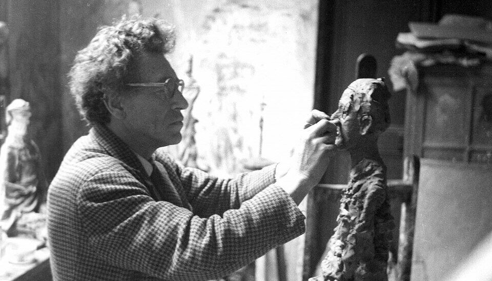 Alberto Giacometti sculpting his wife, Annette.