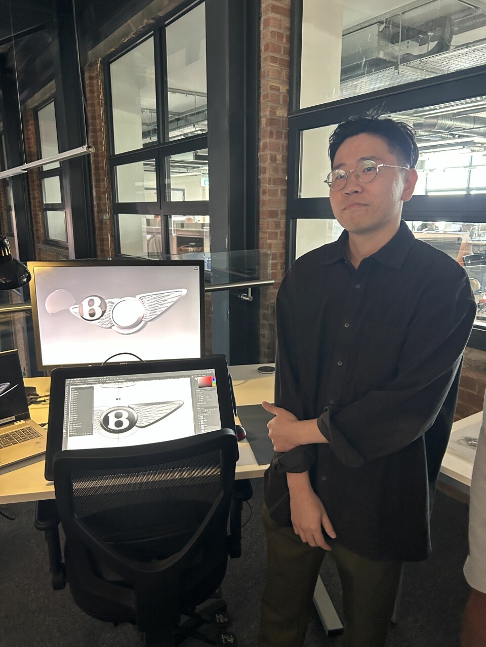 Young Kwang Nam with his design.